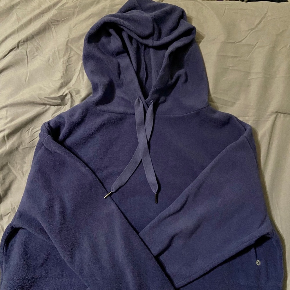 This is a cropped sweatshirt hoodie